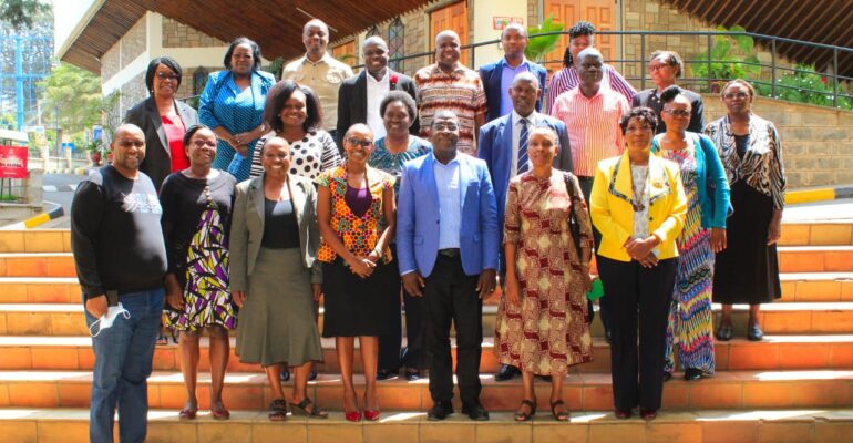 Prof. Dionysious Kiambi with students